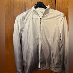 Cutter & Buck Womens lightweight golf windbreaker.